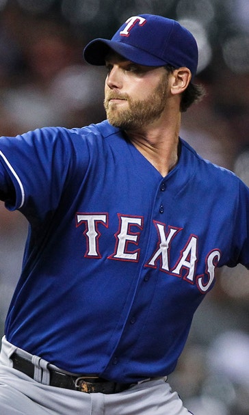 Rangers blow lead in eighth as Astros take win